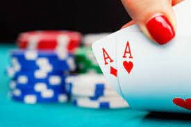 Ganesha Gold live-dealer table with professional croupier and multi-camera broadcast setup