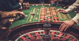 Mobile app showing PUBG Mobile sportsbook and live casino table